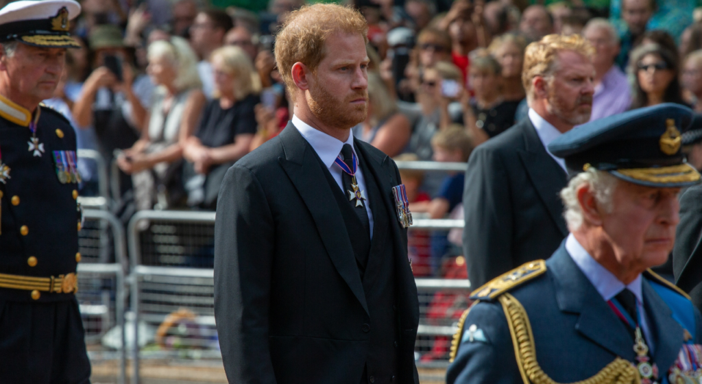 Prince Harry is seen following the coffin Queen Elizabeth II on the Mall on its way from Buckingham Palace to Westminster Hall.