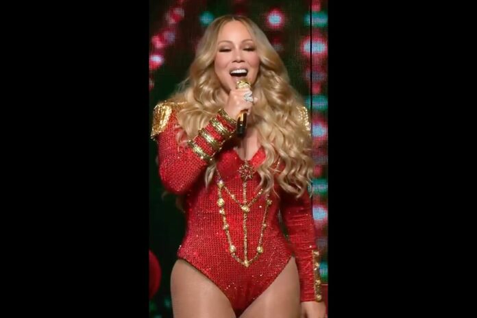 Mariah Carey sets a new record with her iconic Christmas hit, achieving a 17th week atop Billboard's Hot 100 chart. mariahcarey/Instagram